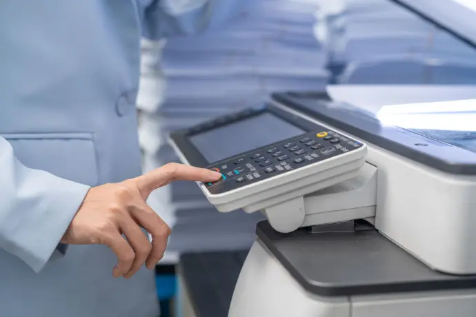 Customer using copier machine services